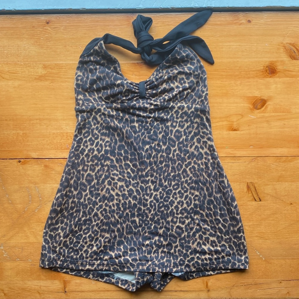 Dollz & Dames cheetah print one-piece swimsuit.
